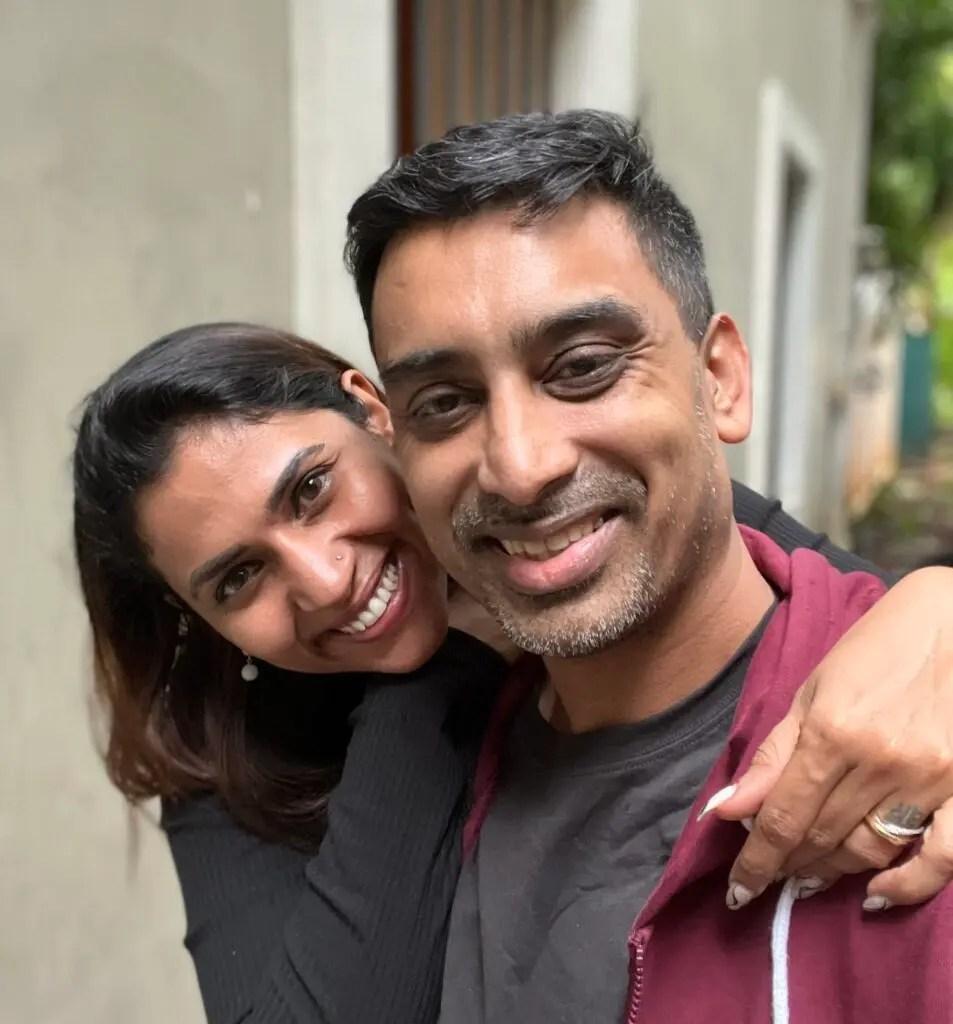 Namrta with her arm around Vinay