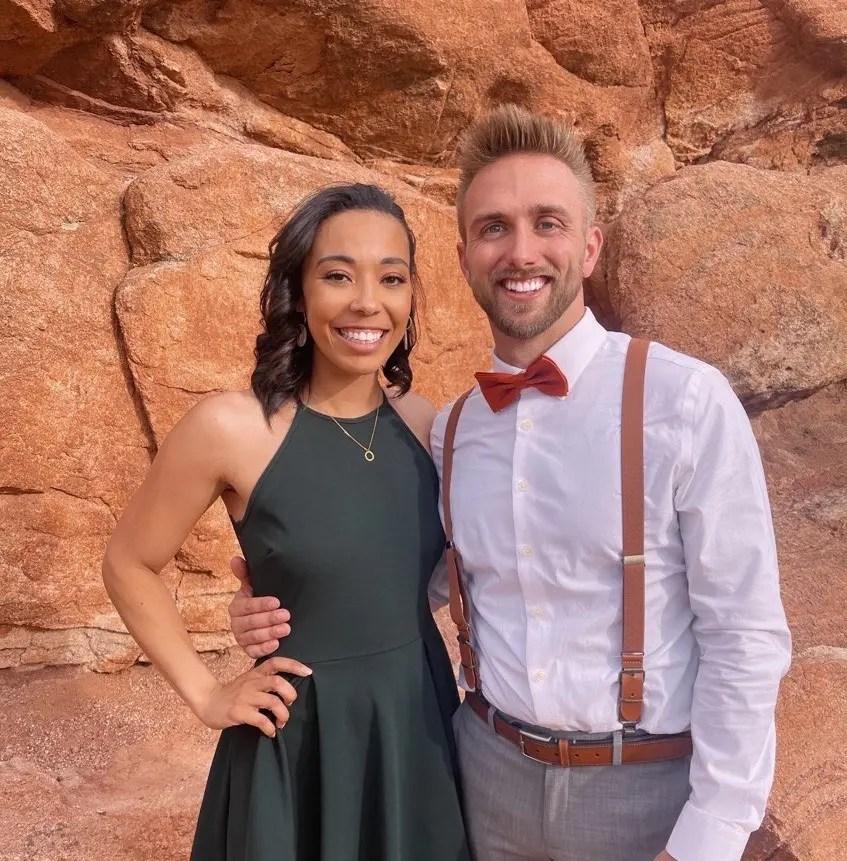 Sierra and Cody dressed up in front of desert rocks.