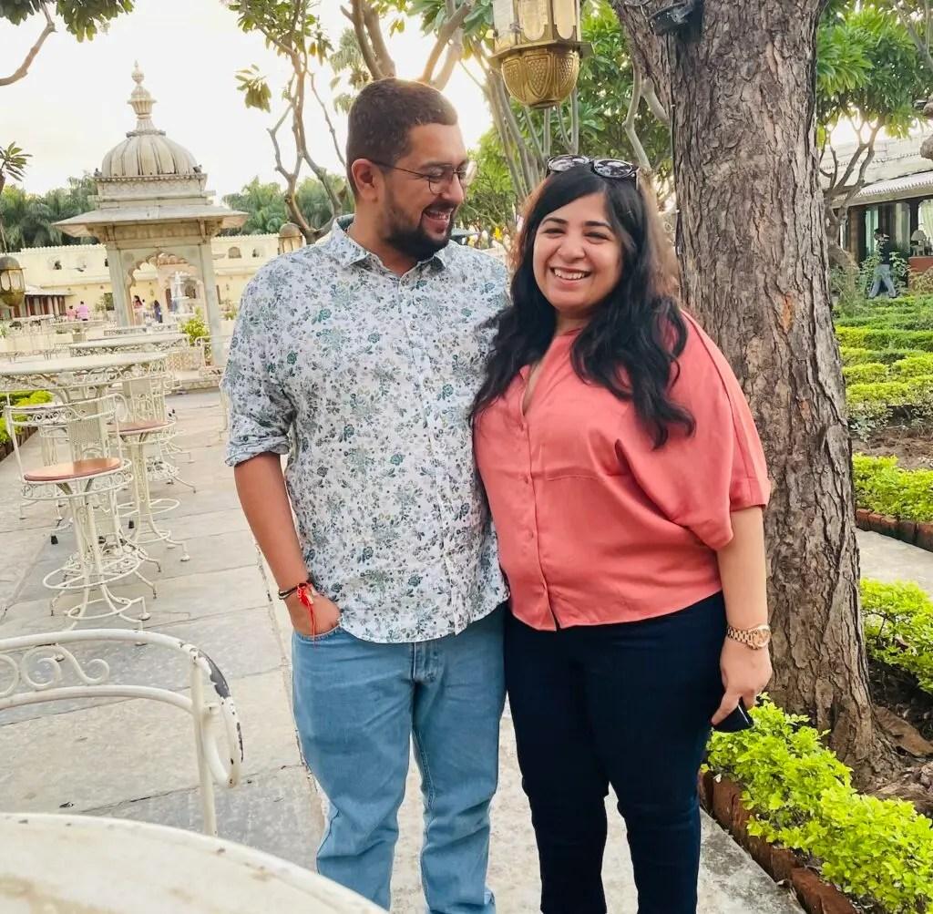 Viraj and Aakriti standing and smiling