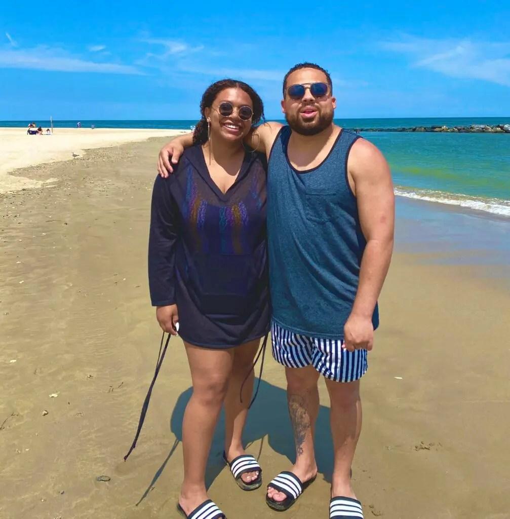 Annika and Drew standing on the beach
