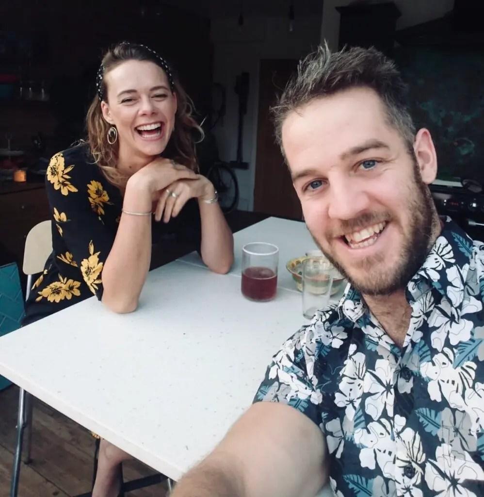Nicola and Matt at a table with drinks