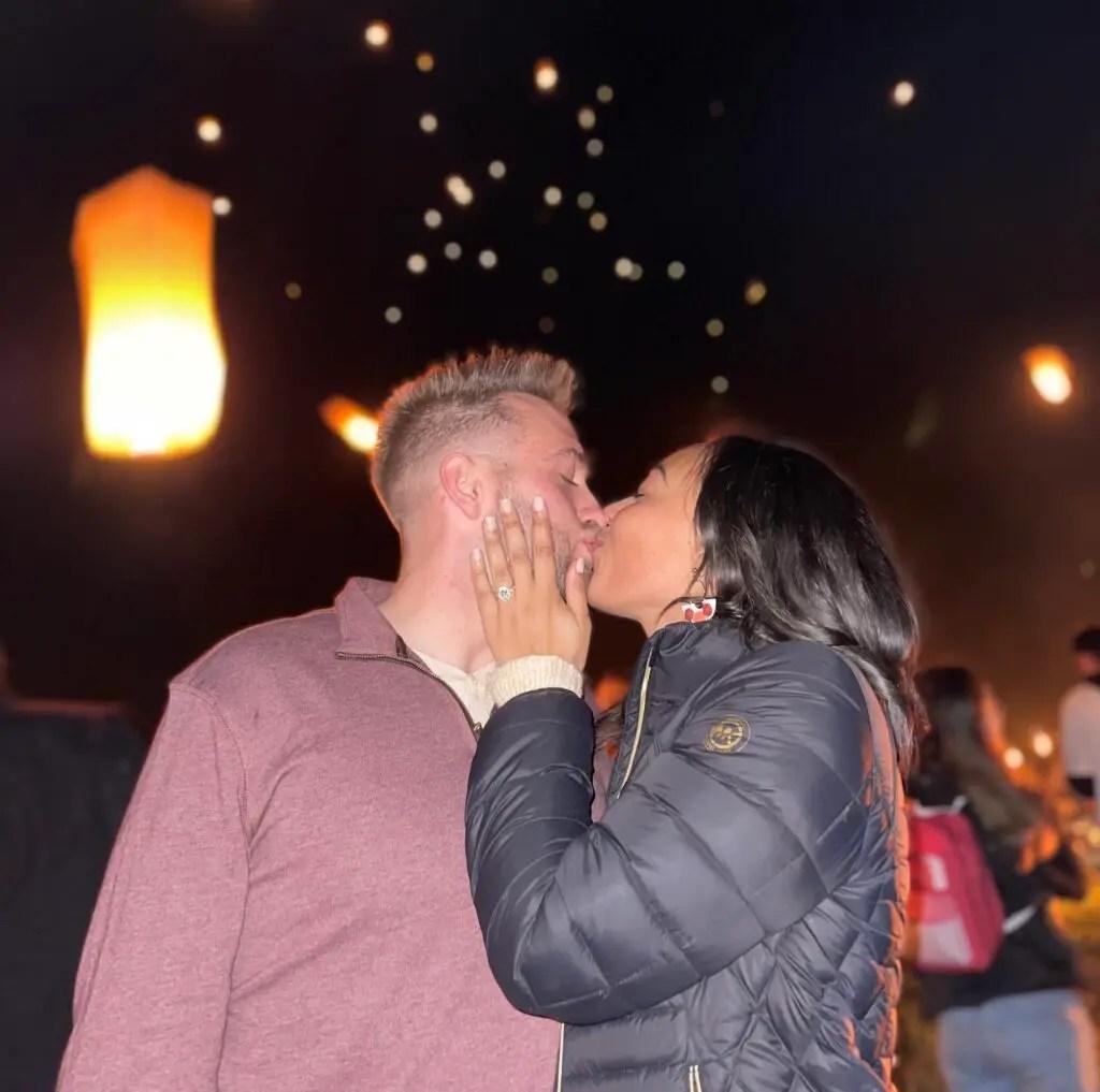 Cody and Sierra kissing at the lantern festival